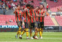 Leones celebrando un gol 